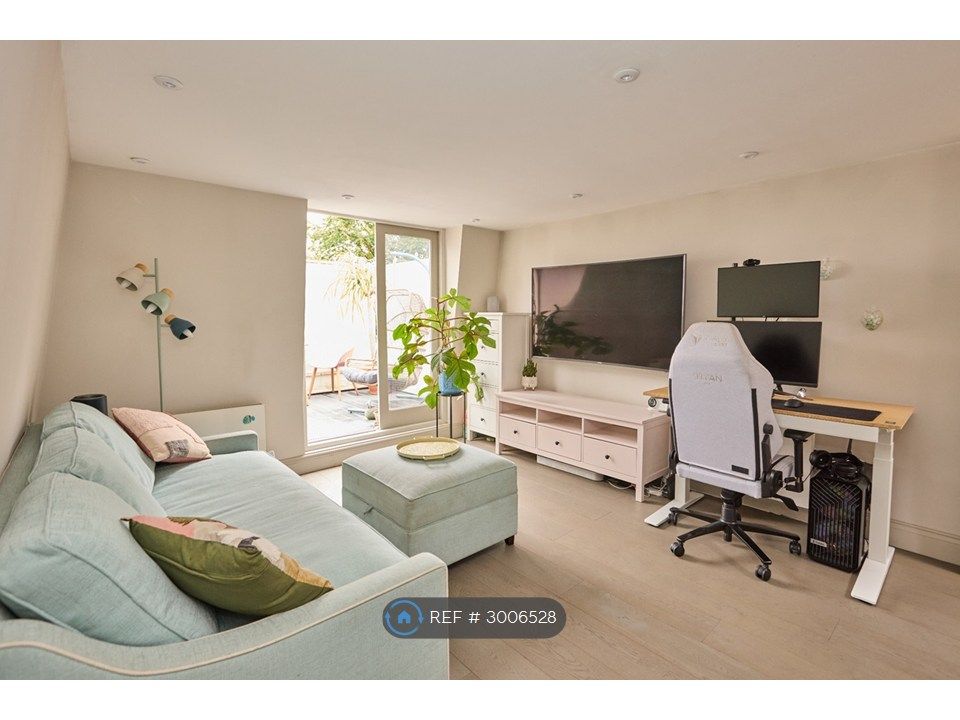 Property photo 1 of 12 Living Area
