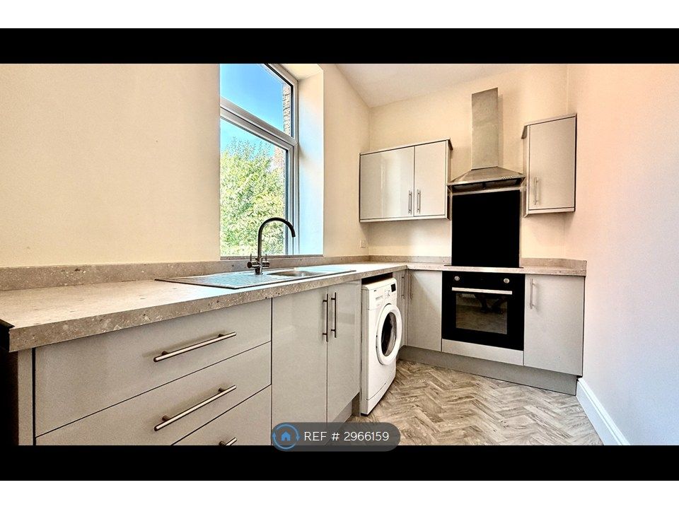 Property photo 1 of 8 Kitchen