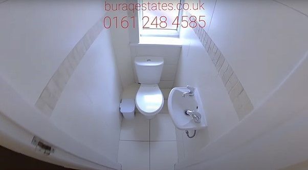 Property photo 2 of 12 Bright And Clean Single Toilet Featuring Modern Wh...