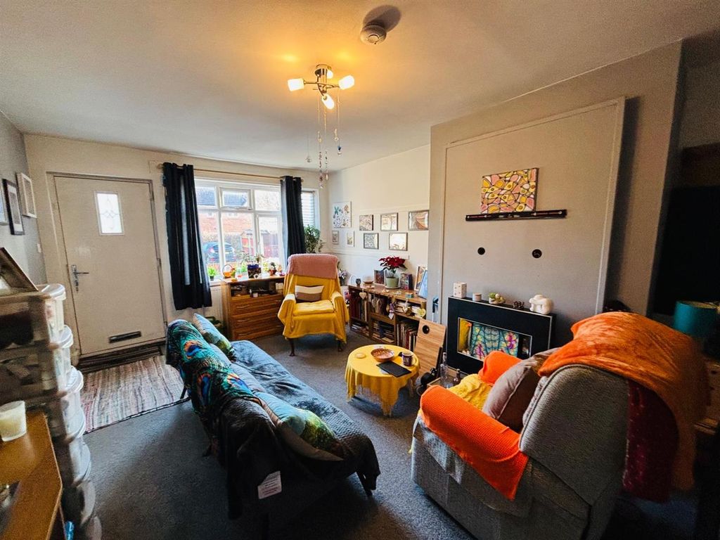 Property photo 2 of 8 Living Room: