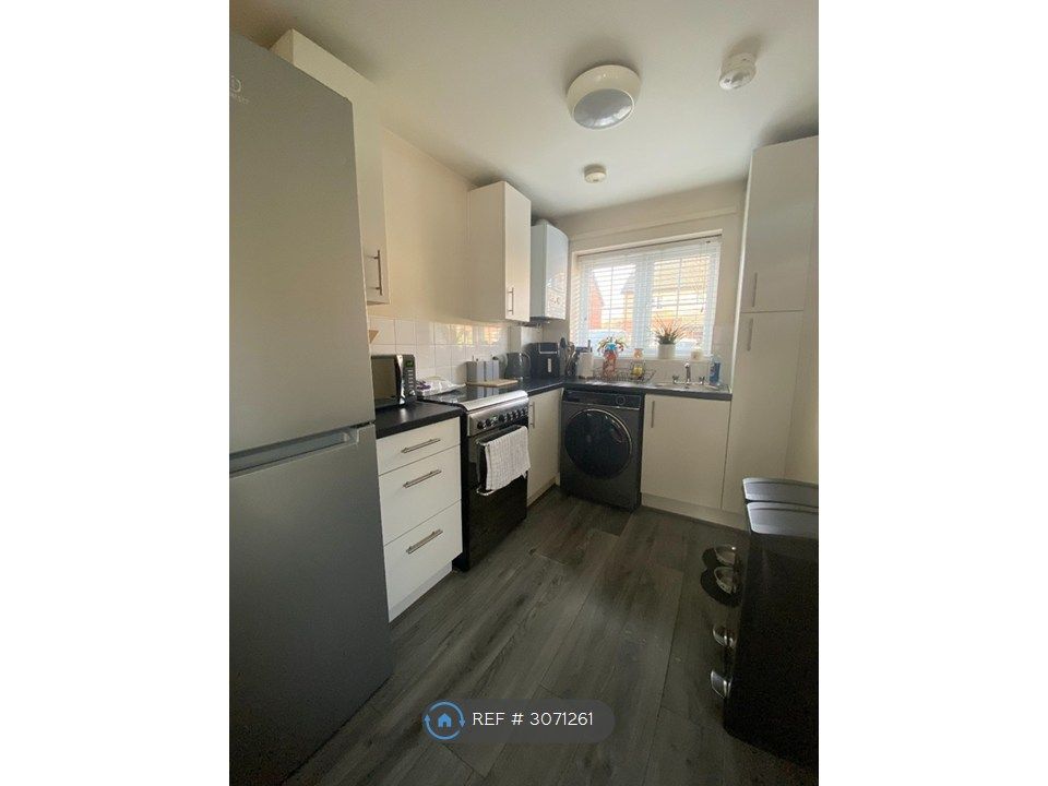 Property photo 2 of 7 Open Plan Living Space: Kitchen Side