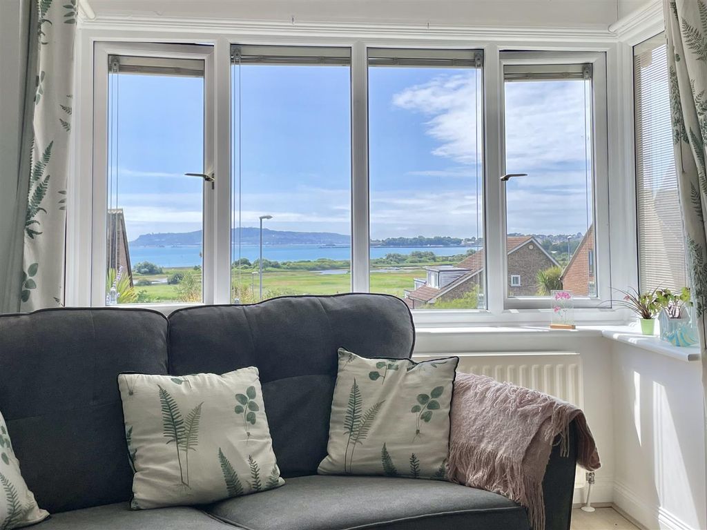 Property photo 3 of 32 Seated In Living Room