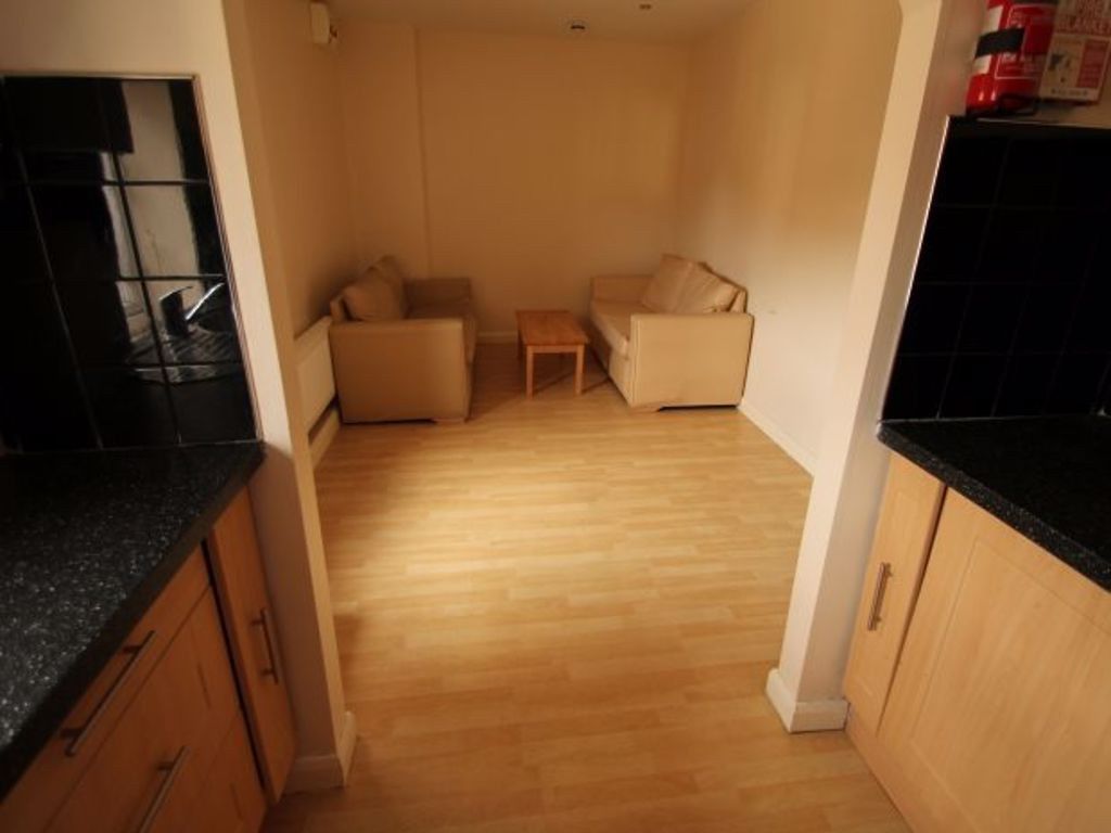 Property photo 3 of 6 A Cozy Living Room With Light Wooden Flooring And ...