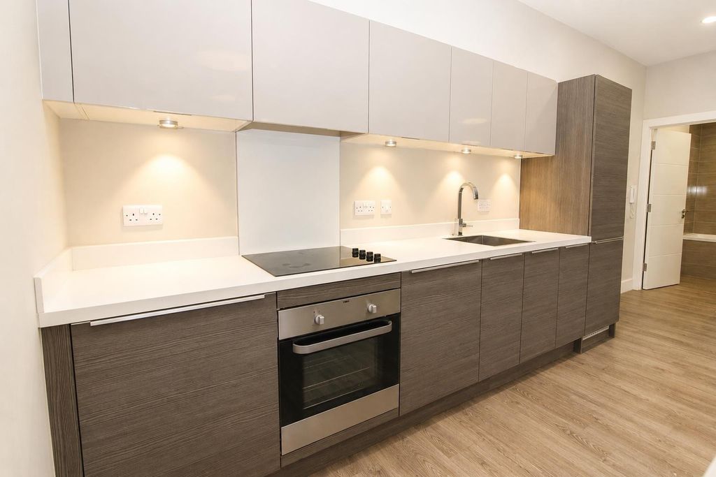 Property photo 2 of 7 Modern Kitchen With Sleek Integrated Appliances...