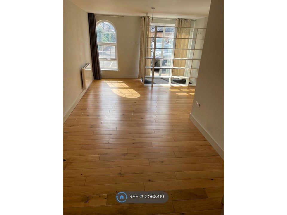 Property photo 1 of 8 Living Area 1