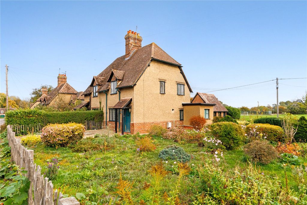 Property photo 1 of 12 Front/Side Elevation