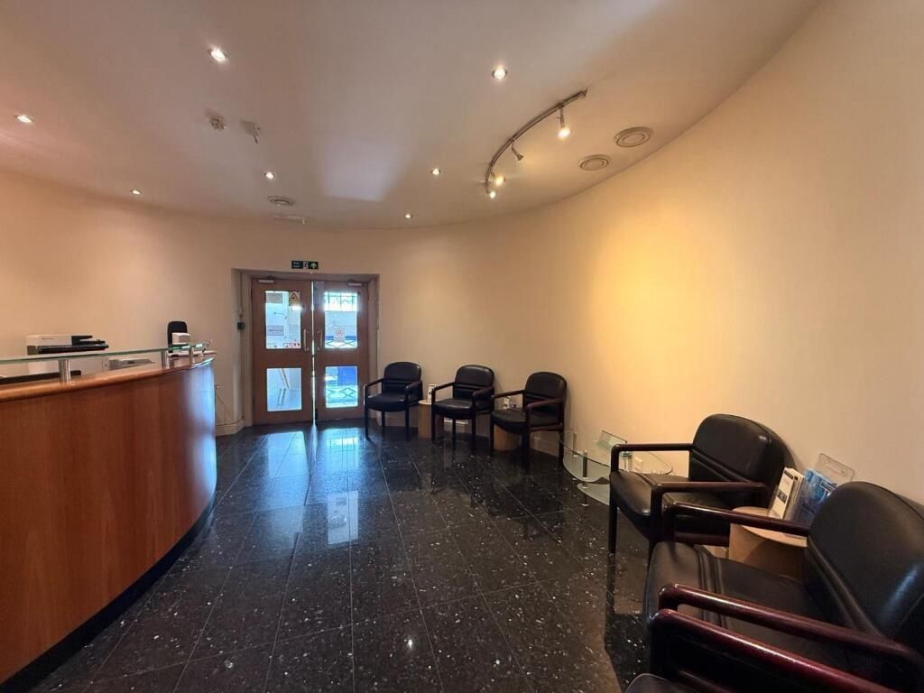 Property photo 3 of 4 Bright, Welcoming Reception Area With Curved Woode...