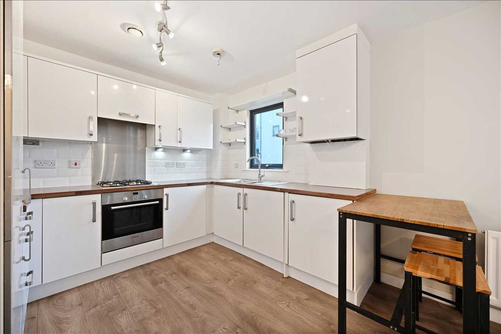 Property photo 2 of 8 Kitchen
