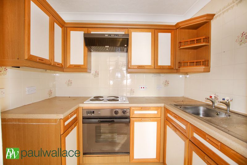 Property photo 3 of 8 Kitchen