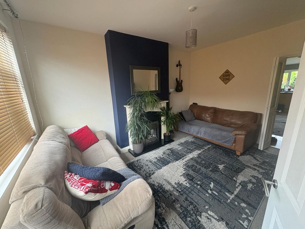 Property photo 2 of 11 Living Area