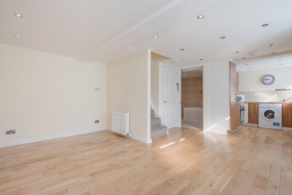 Property photo 2 of 11 Livingroom Angle 2