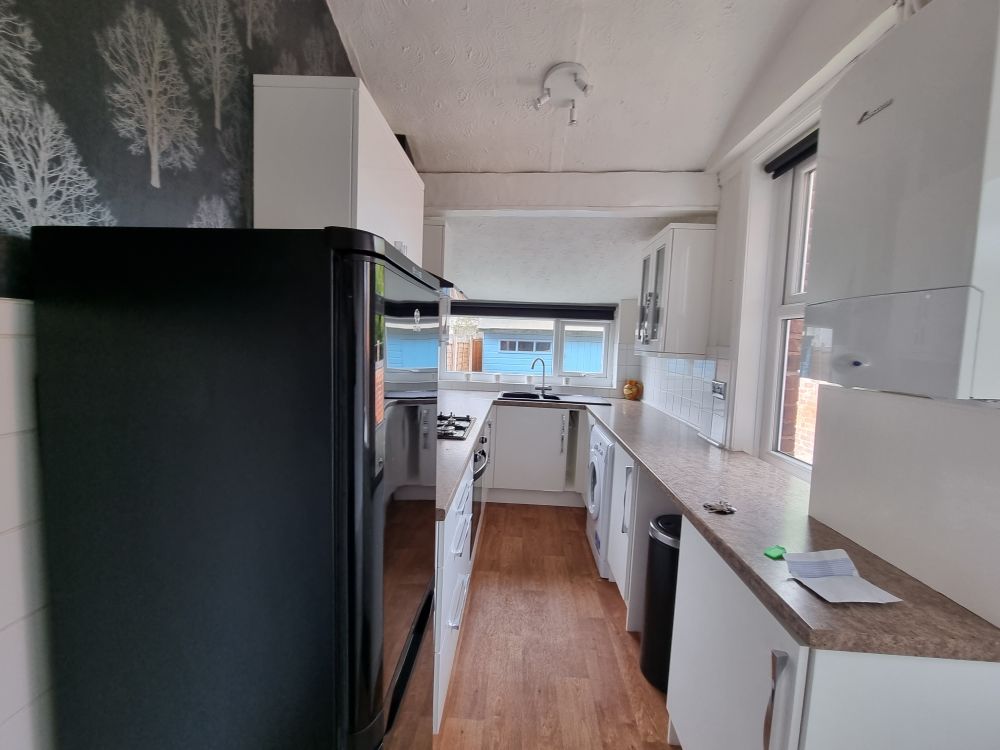 Property photo 3 of 7 Kitchen