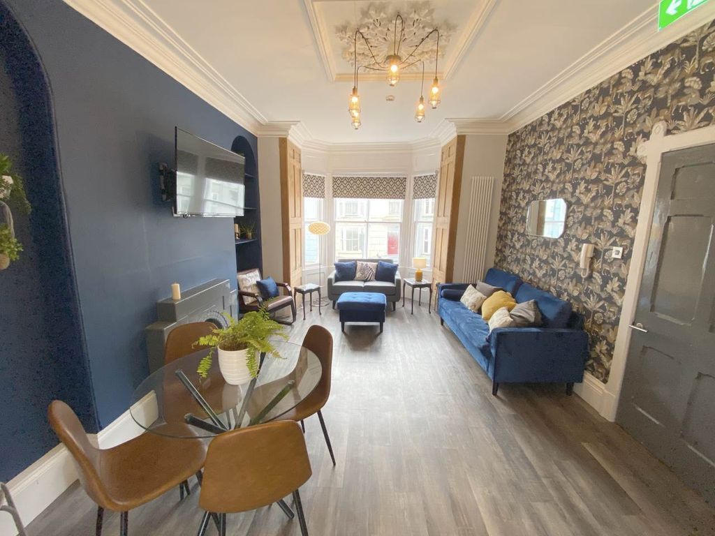 Property photo 2 of 8 Living Room