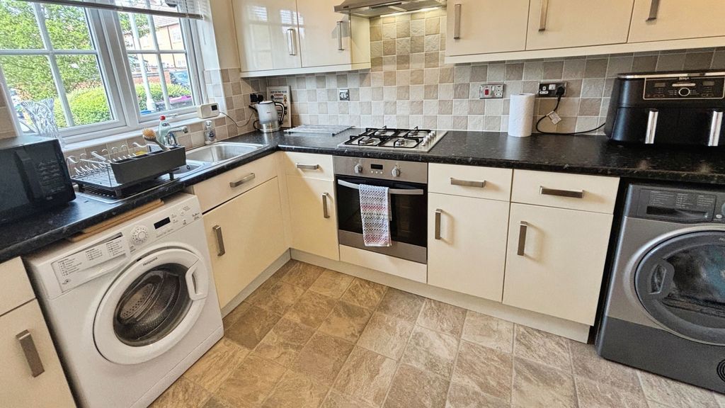 Property photo 2 of 12 Kitchen