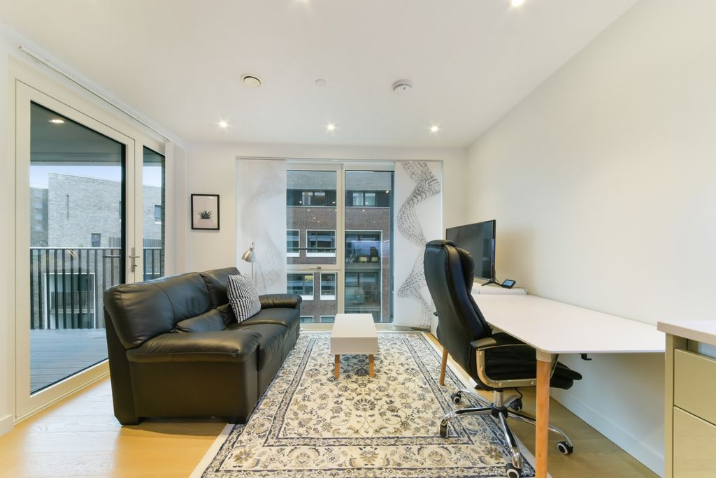 Property photo 1 of 10 Living Area