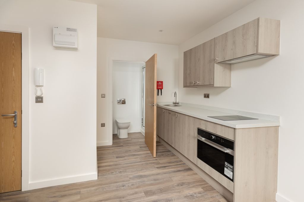 Property photo 2 of 3 A Modern And Well-Maintained Kitchen With Ample Co...
