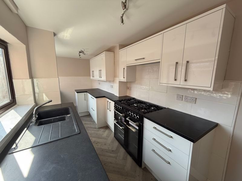 Property photo 2 of 8 Kitchen