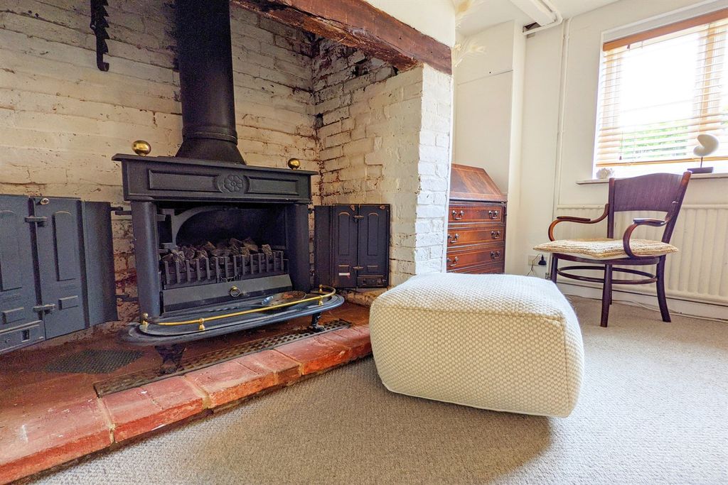Property photo 3 of 7 Fireplace