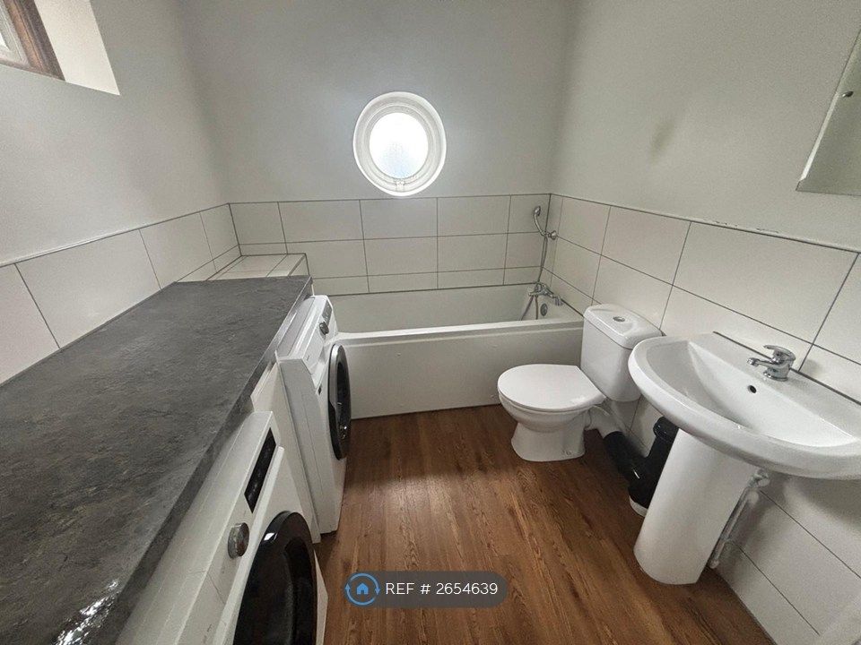 Property photo 2 of 13 Laundry Room And Downstairs Bathroom