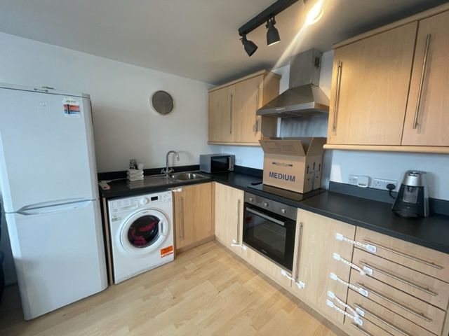 Property photo 3 of 6 Kitchen