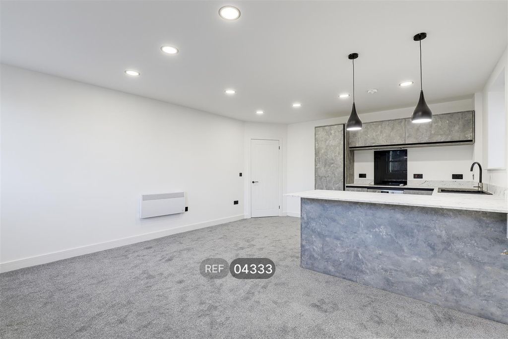 Property photo 3 of 12 Kitchen/Living Area