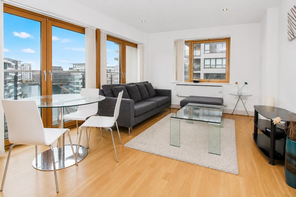 Property photo 3 of 9 Bright Modern Living Area With Floor-To-Ceiling Wi...