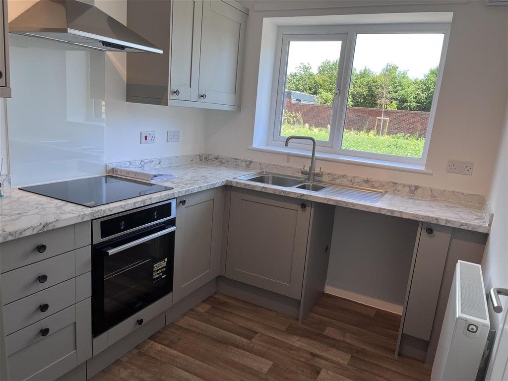 Property photo 2 of 12 Kitchen