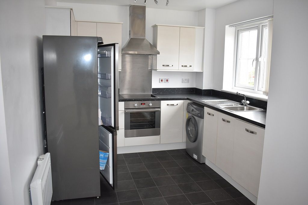 Property photo 3 of 7 Kitchen