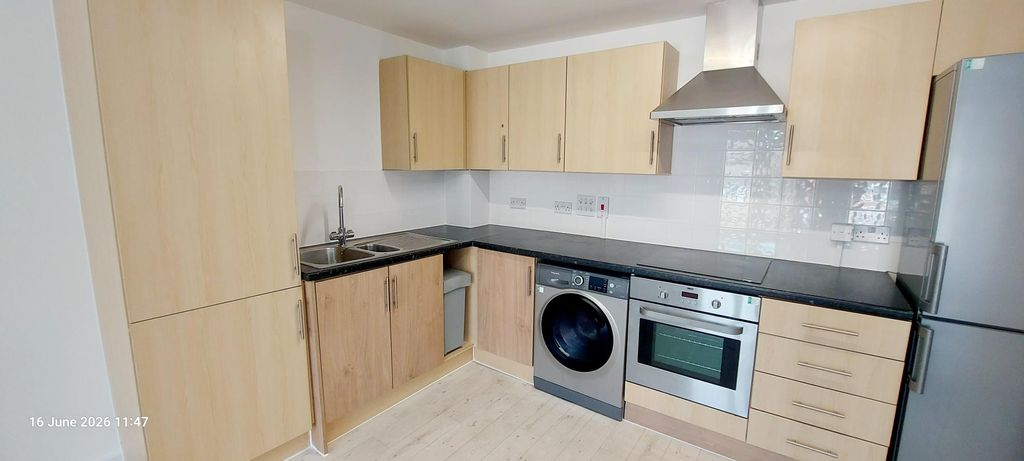 Property photo 2 of 11 Kitchen