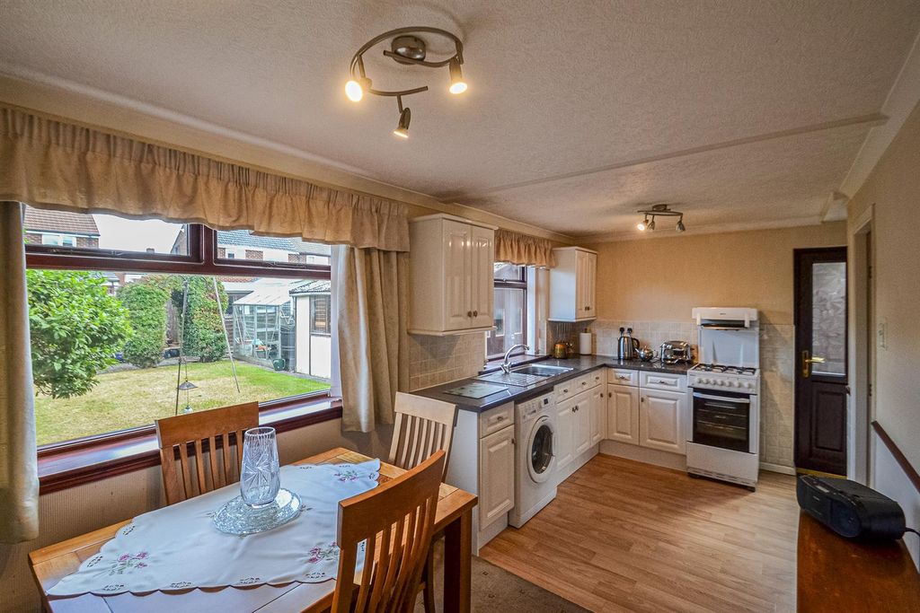 Property photo 3 of 13 Dining Kitchen
