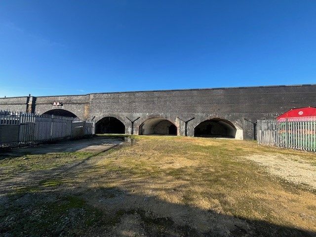 Property photo 1 of 3 An Open Yard With Metal Fencing Around It.