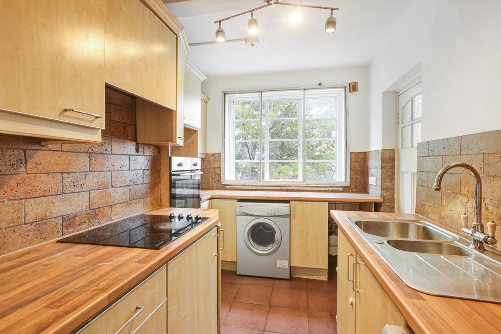 Property photo 3 of 12 Kitchen