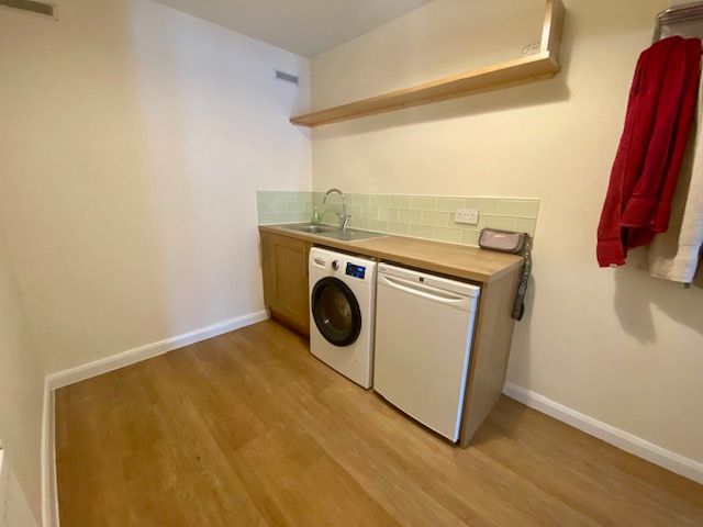 Property photo 2 of 11 Utility Room
