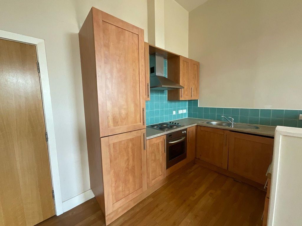 Property photo 3 of 8 Kitchen