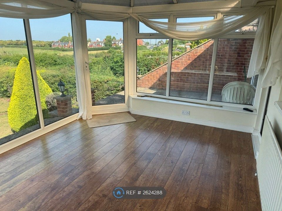 Property photo 3 of 14 Conservatory