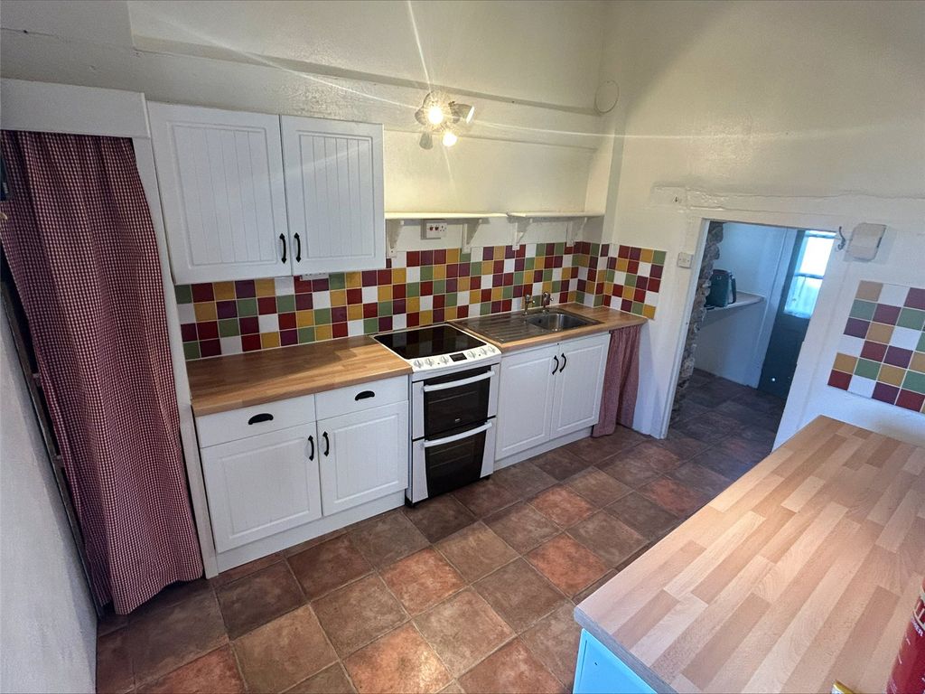Property photo 2 of 8 Kitchen