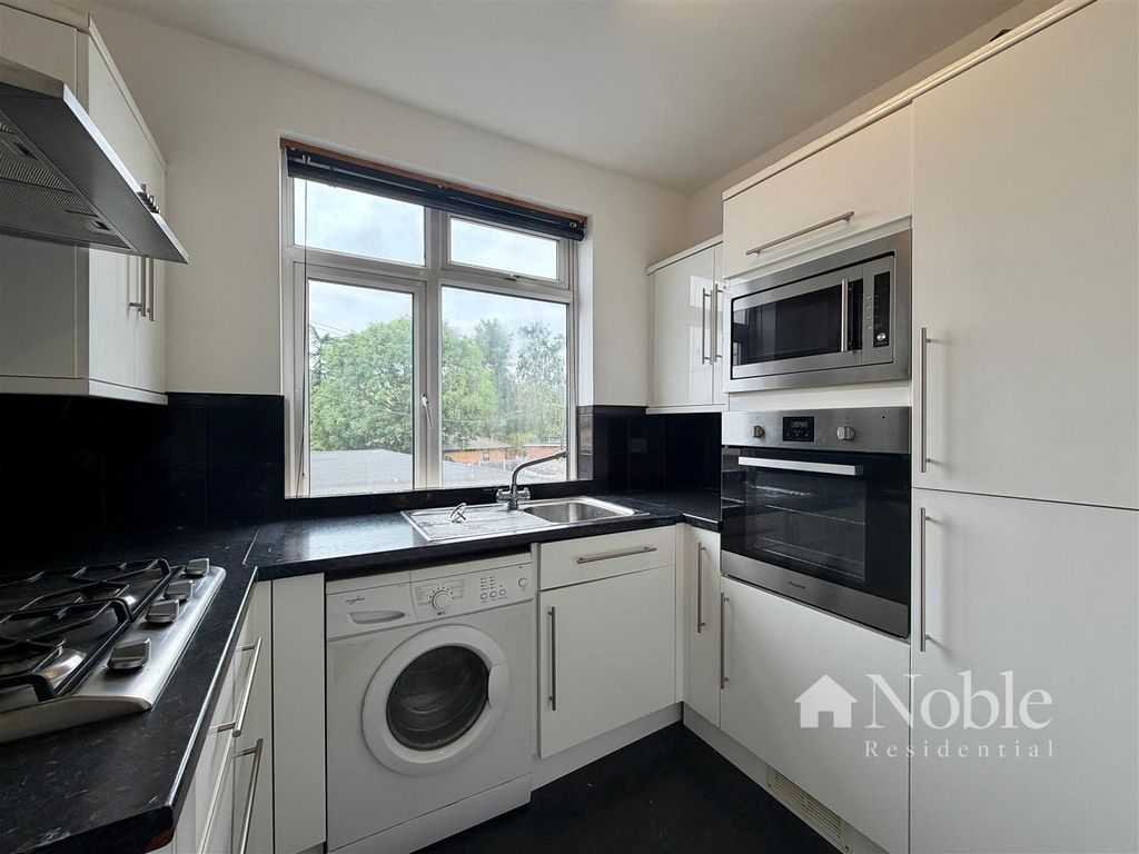 Property photo 3 of 12 Kitchen