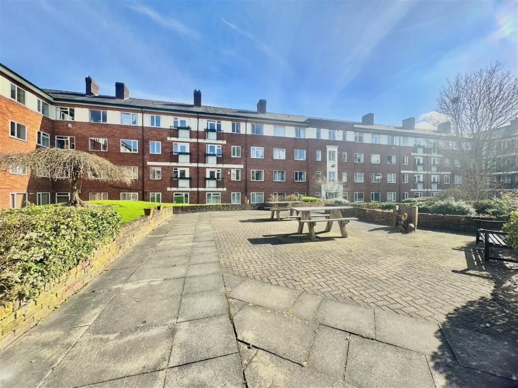 Property photo 2 of 12 Spacious And Bright Exterior View Of A Well-Mainta...