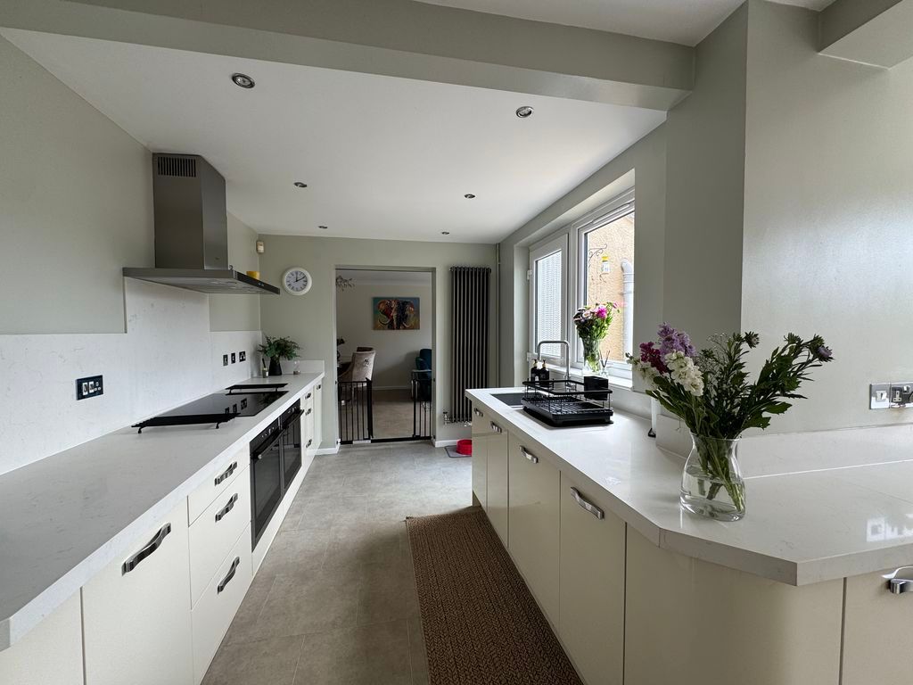 Property photo 3 of 29 Kitchen To Family Room
