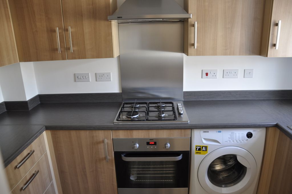 Property photo 3 of 7 Kitchen