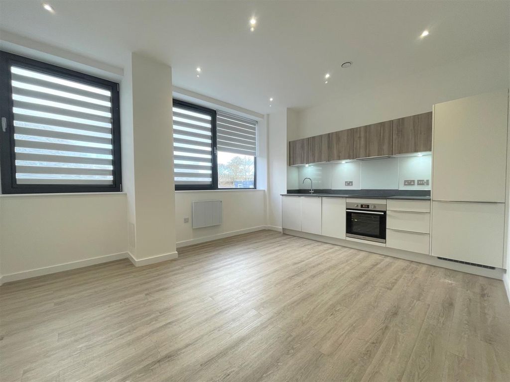 Property photo 2 of 4 Kitchen & Living.Jpg