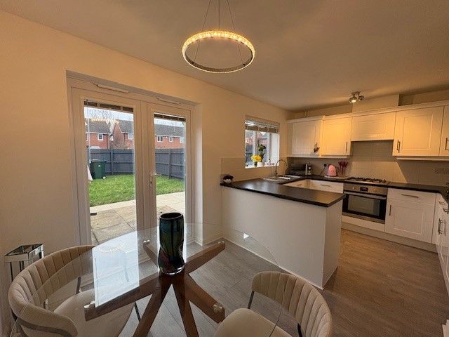 Property photo 2 of 12 Living Room