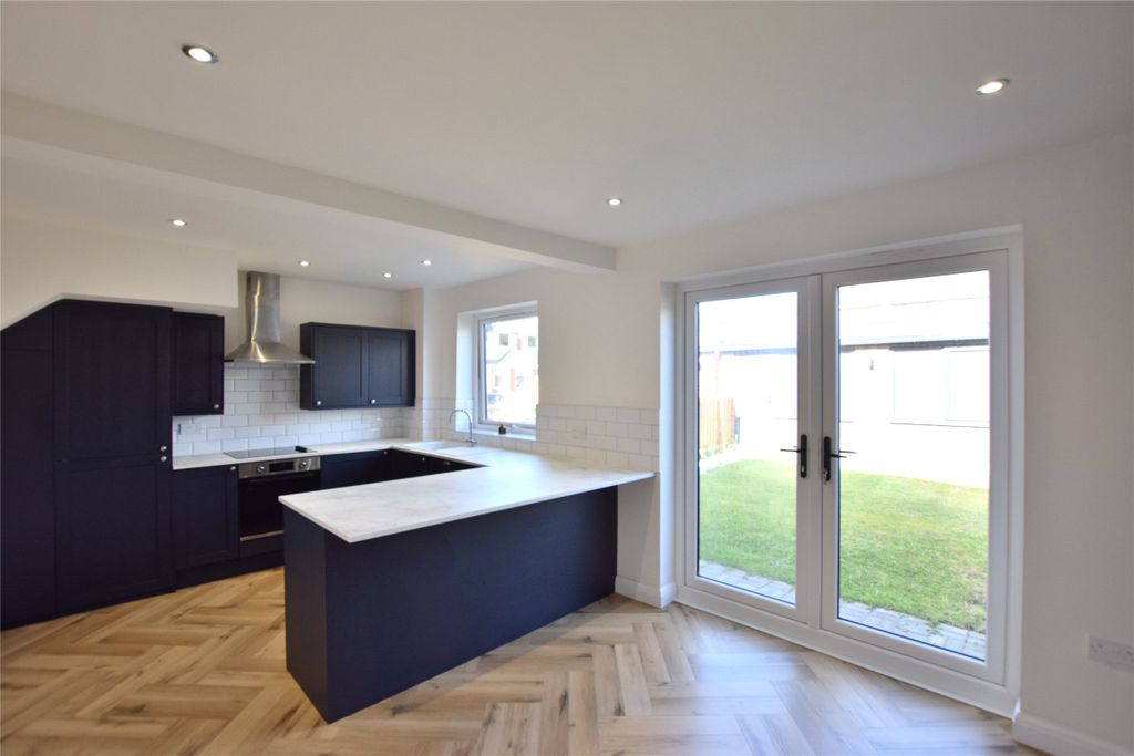 Property photo 3 of 12 Dining Kitchen