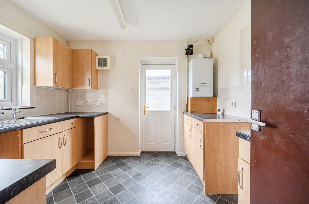 Property photo 3 of 12 Kitchen