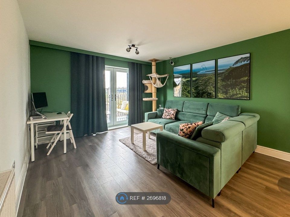 Property photo 2 of 13 Living Room With Large Sofa And Coffee Table