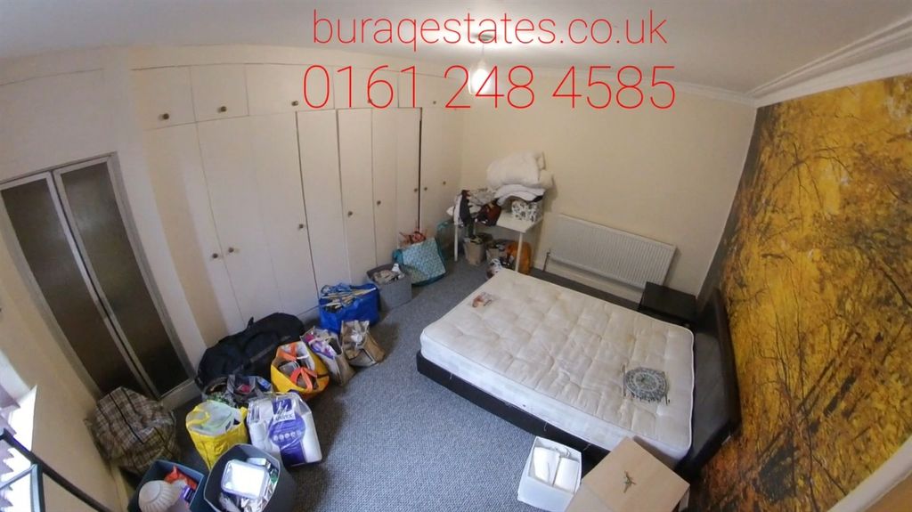 Property photo 3 of 15 A Double Bedroom Featuring A Large Built-In Wardro...