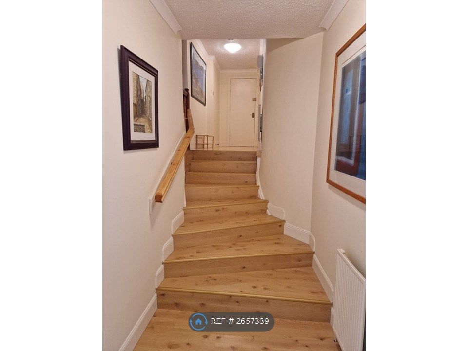 Property photo 2 of 11 Welcoming Entrance Hallway