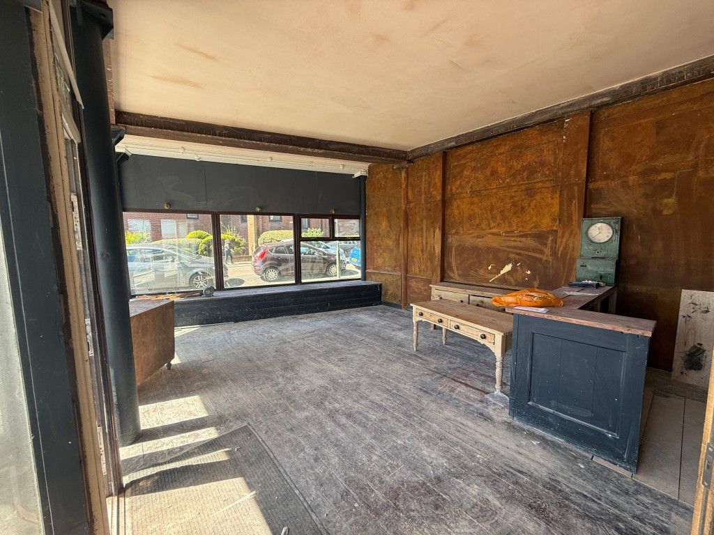 Property photo 2 of 3 Open Plan Floor Area With Glass Frontage And Wooden Floor