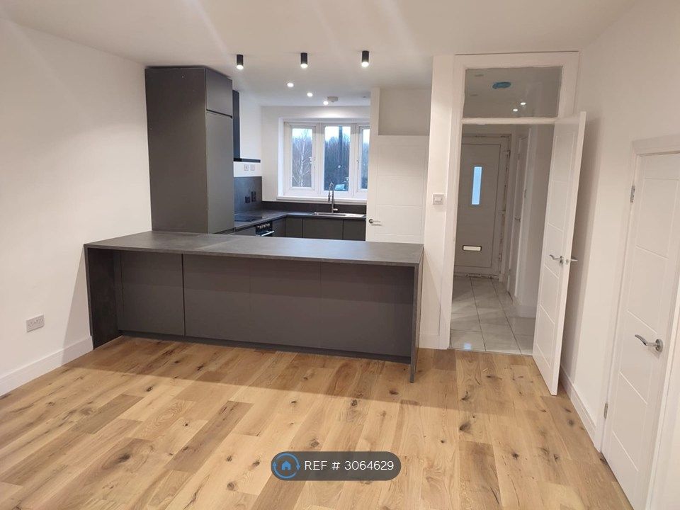 Property photo 2 of 22 Bar And Kitchen Area