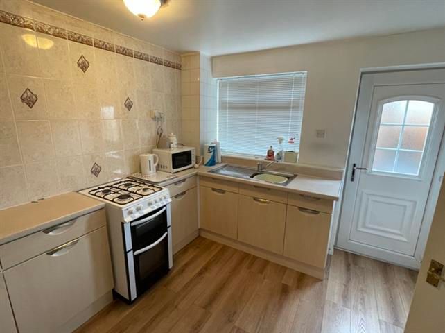 Property photo 3 of 8 Kitchen